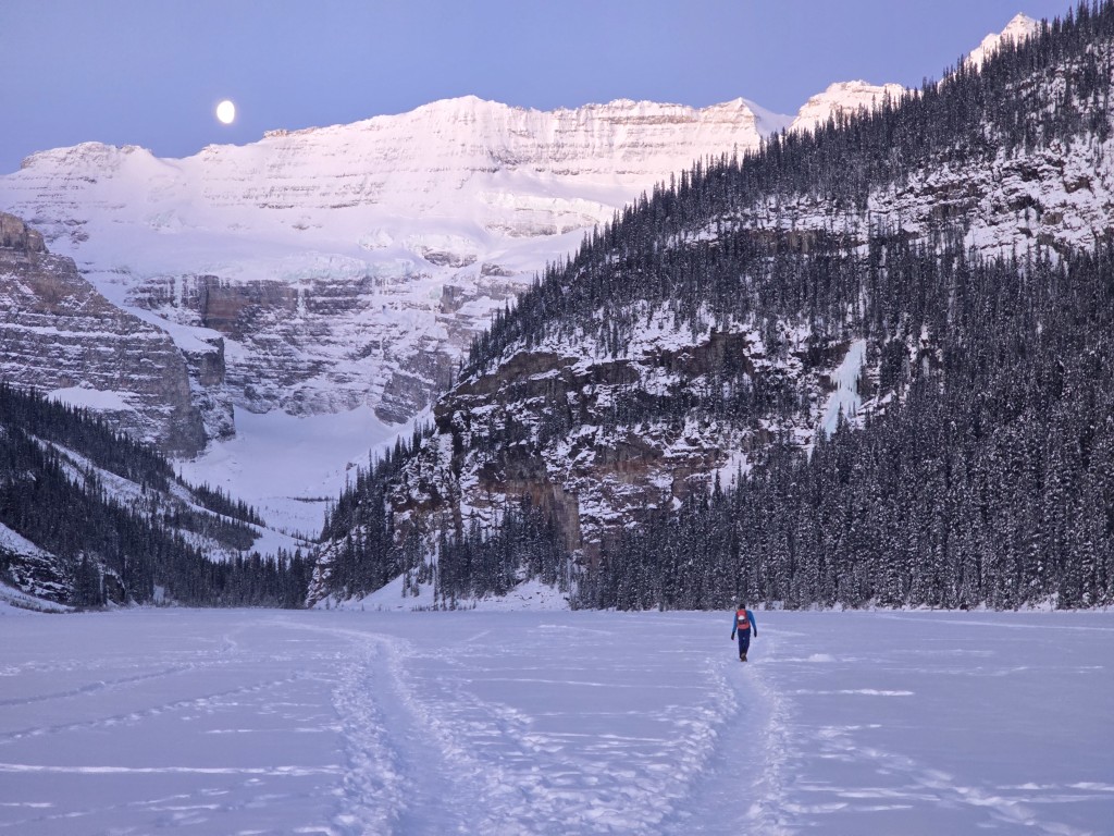 A very cold approach across Lake Louise, the falls in the background on the right (Noah Macdonald)